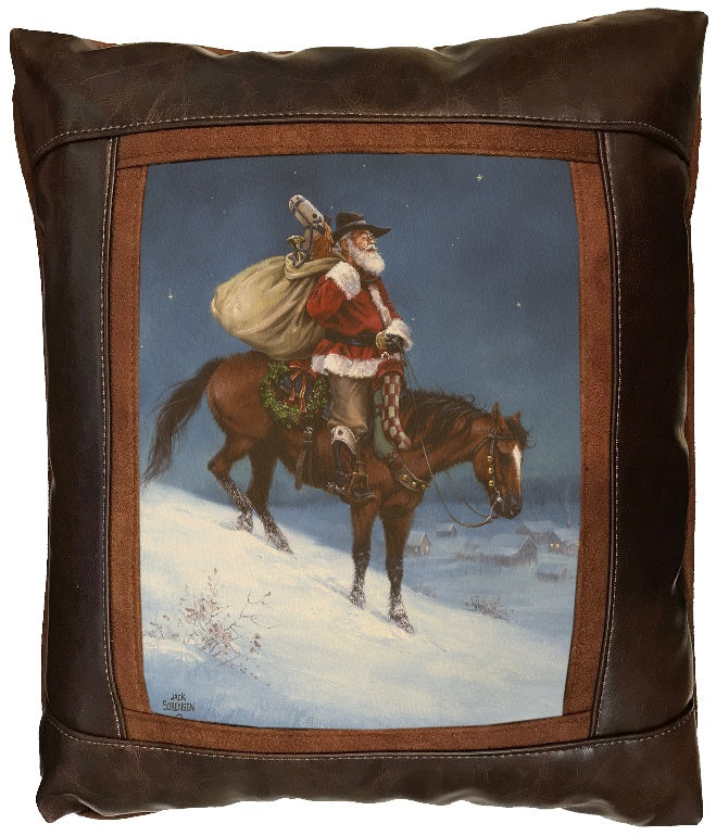 Decorative pillow with a Christmas scene of Santa Claus riding a horse in the snow.