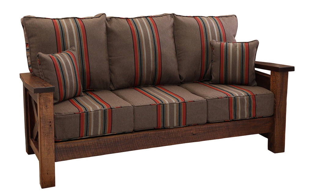 Brown sofa with striped cushions on a white background