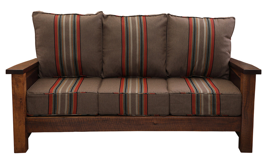 Brown wooden sofa with striped cushions on a white background