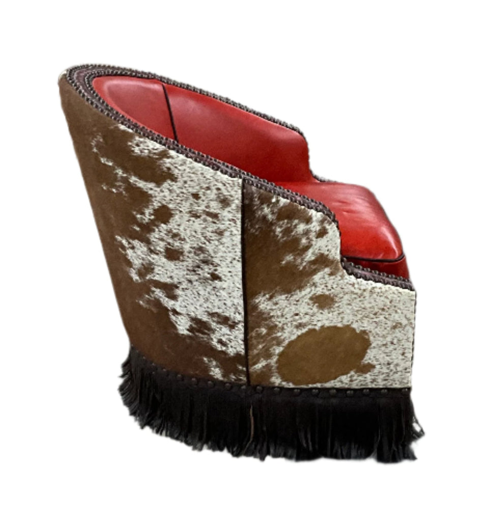 side view showing natural cowhide leather and partial view of red leather seat and inside back