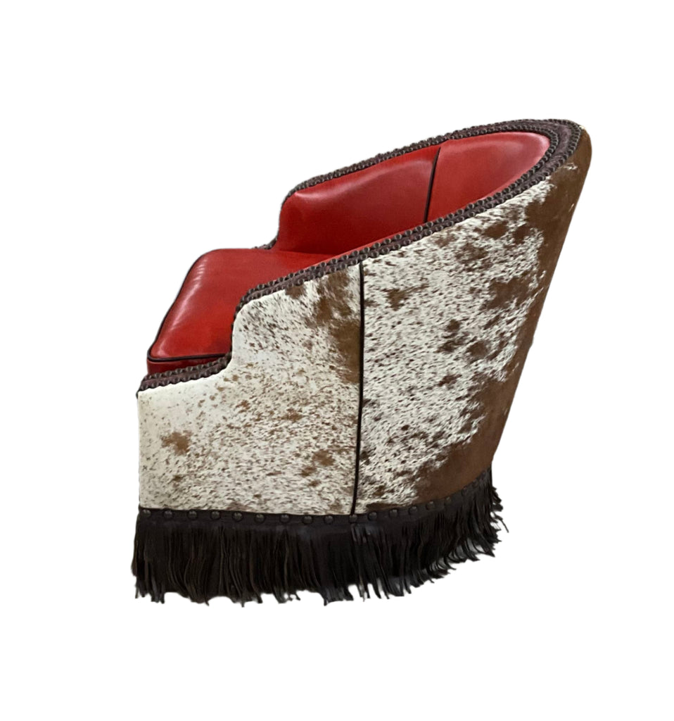 opposite side view showing natural cowhide leather and partial view of red leather seat and inside back