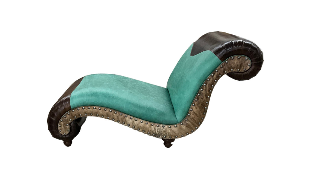 Turquoise lounge chair with wavy brown pattern on a checkered floor.
