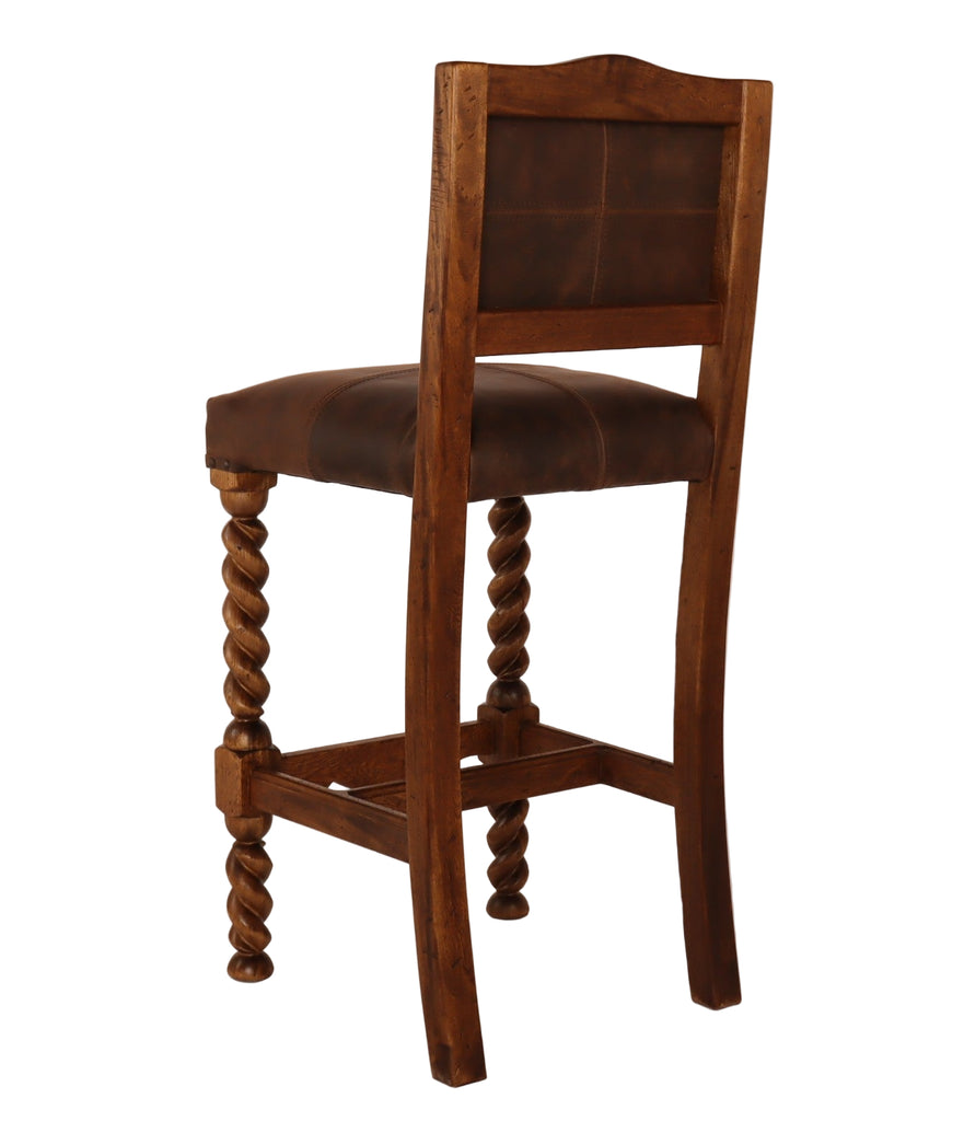 Wooden bar stool with brown leather seat and backrest on a beige background