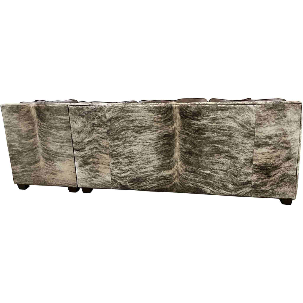 Rear view of the Aberdeen Cafe Modular Sofa, showcasing its exotic brindle cowhide paneling and seamless modular design for a luxurious Western-inspired look.