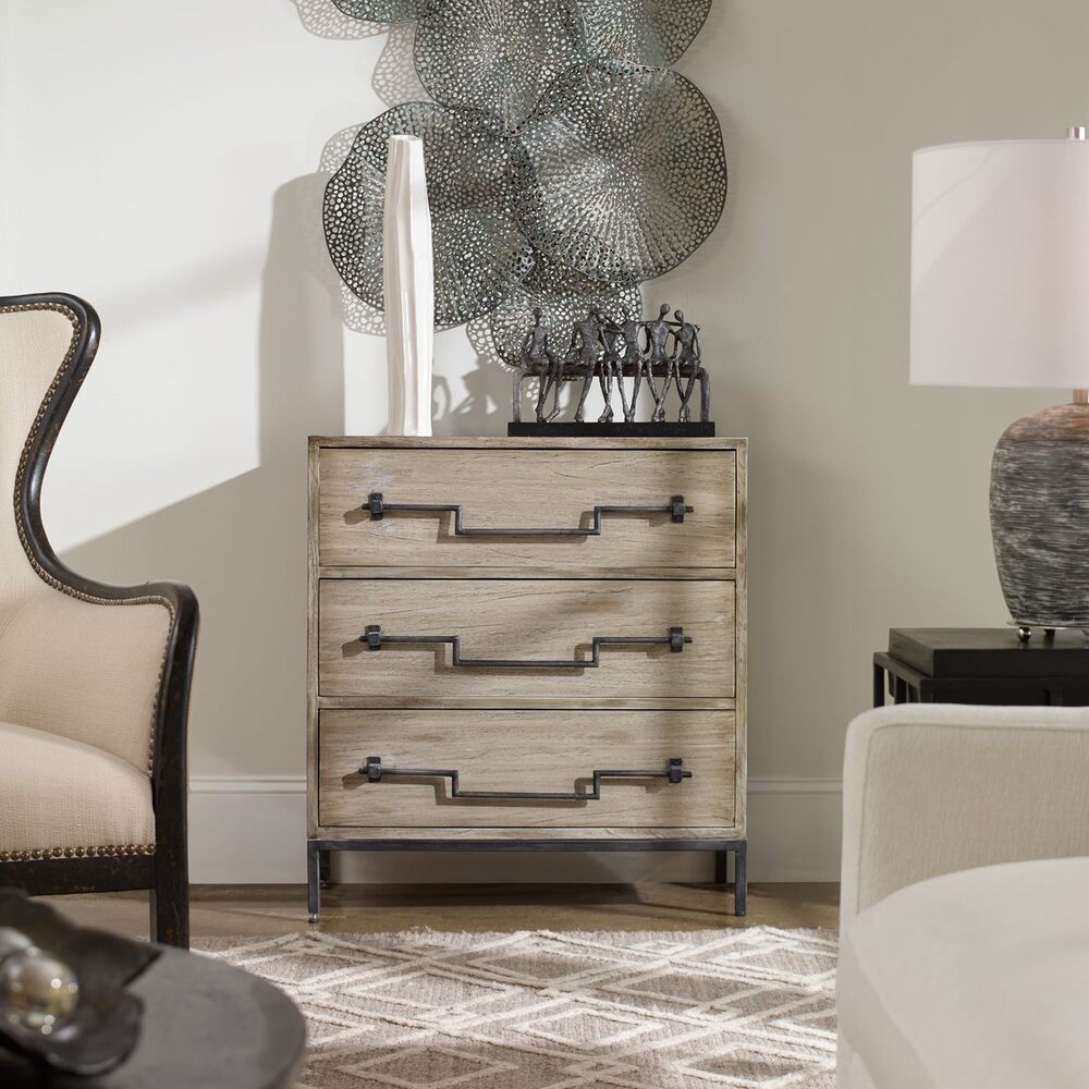 Aged ivory accent chest featuring intricate detailing and a soft, distressed finish, perfect for adding character to any room.