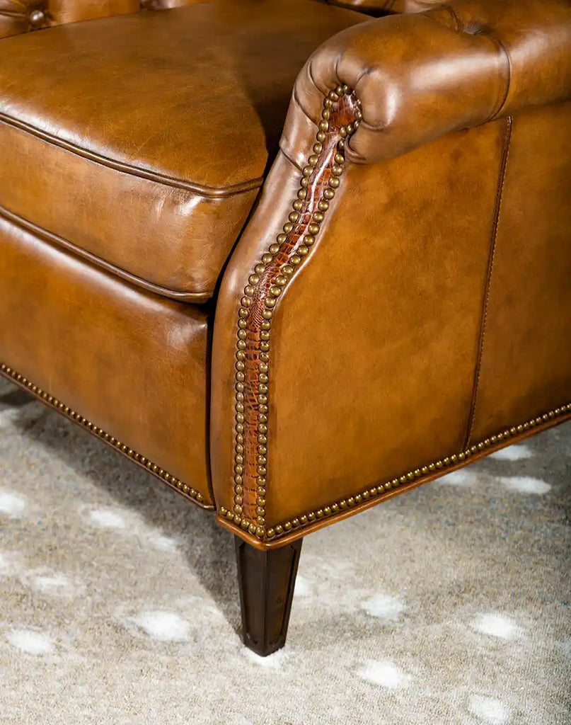 Detailed view of the chair's dark-stained wooden legs, highlighting the solid hardwood construction and elegant design.