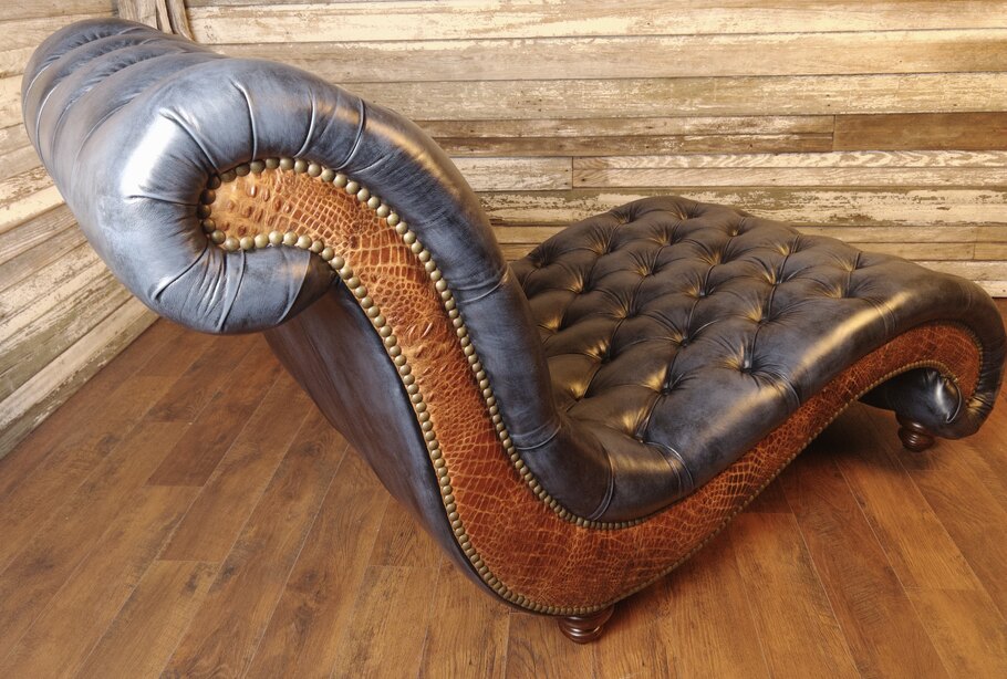 Detailed view of the gator hornback accents on the sides of the Baltimore Chaise Lounge, adding a distinctive flair.