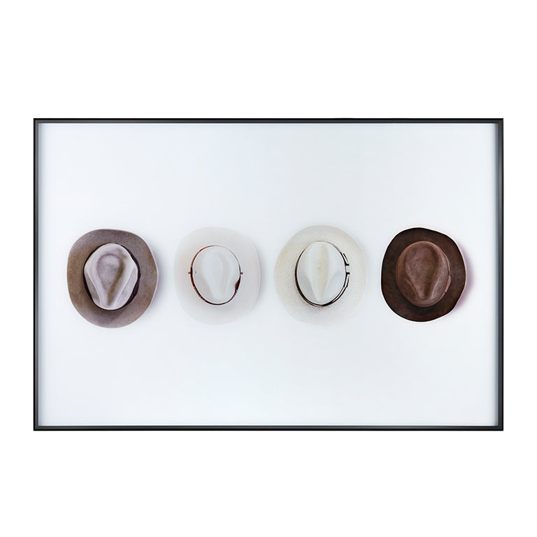 Set of four hats on a white background