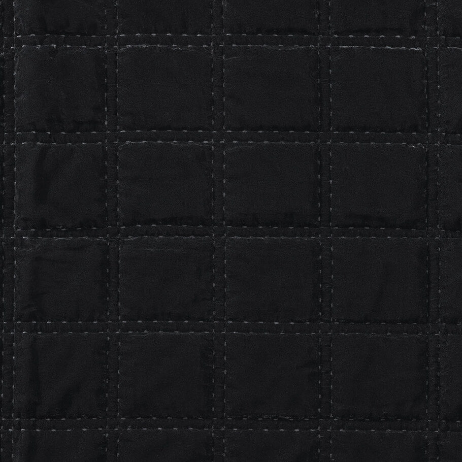 Detailed view highlighting the intricate double box stitch quilting on the Black Faux Silk Velvet Quilt, enhancing texture and depth.