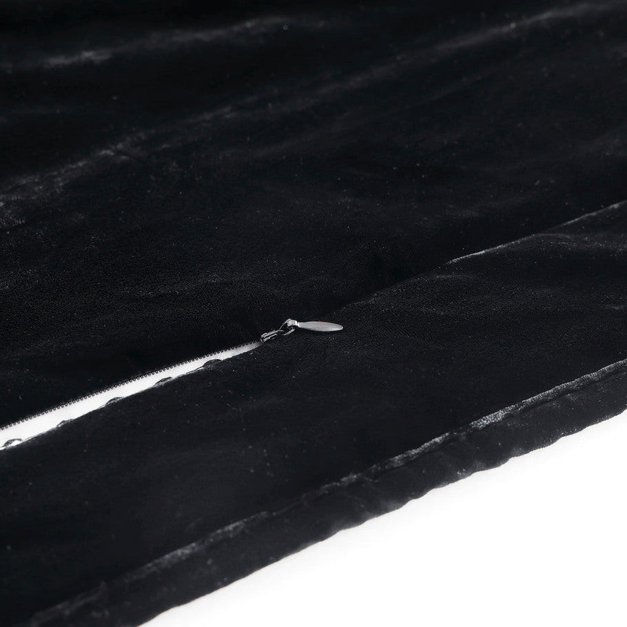 Close-up showcasing the smooth, faux silk velvet fabric of the Black Quilt, offering a luxurious feel and subtle sheen.