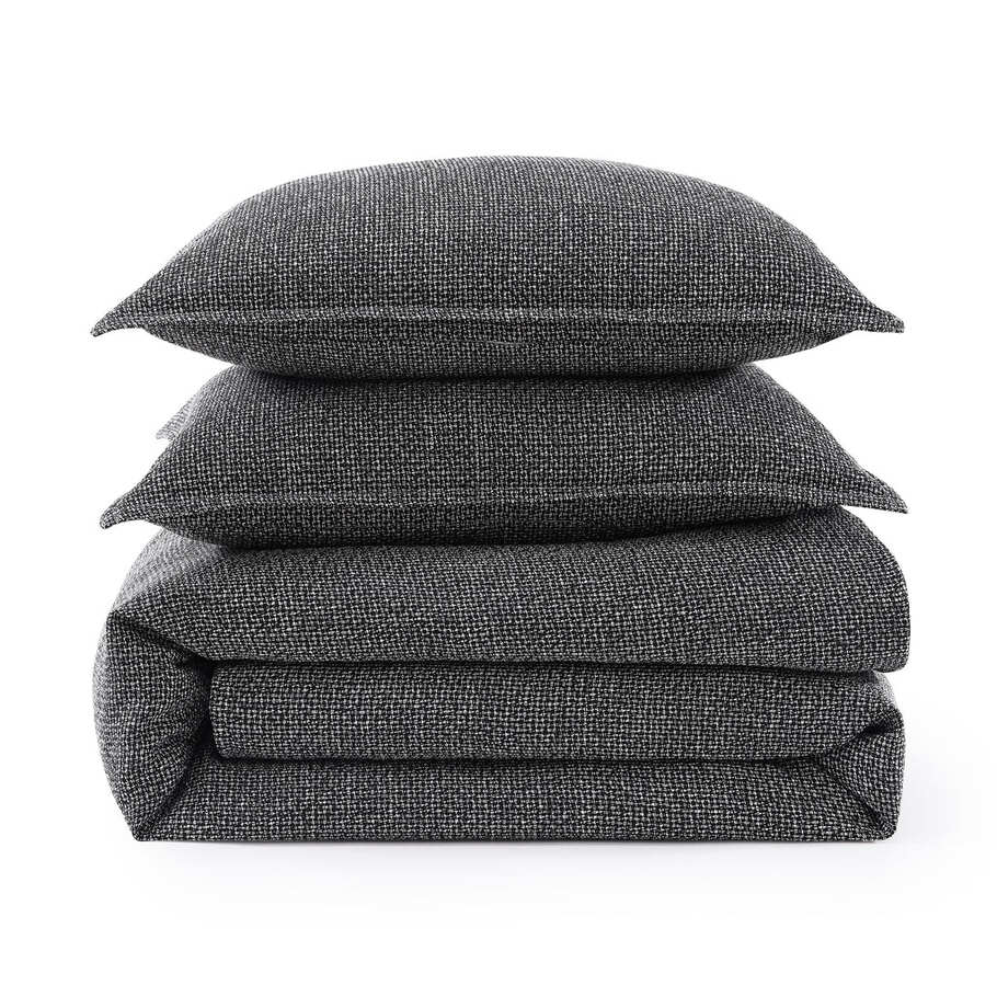 Black Tweed Bedding Set styled with matching pillow shams, emphasizing cohesive design and texture