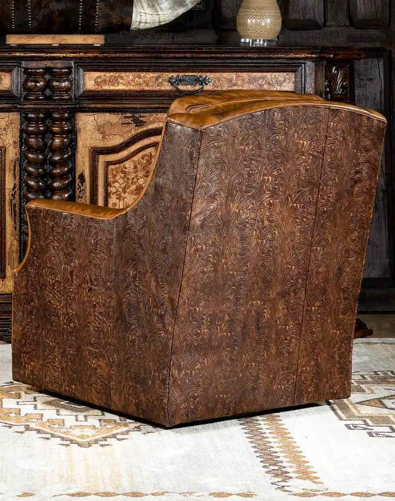 Rear view of the Boston Leather Swivel Chair displaying the hand-burnished, embossed floral pattern on premium top-grain leather.