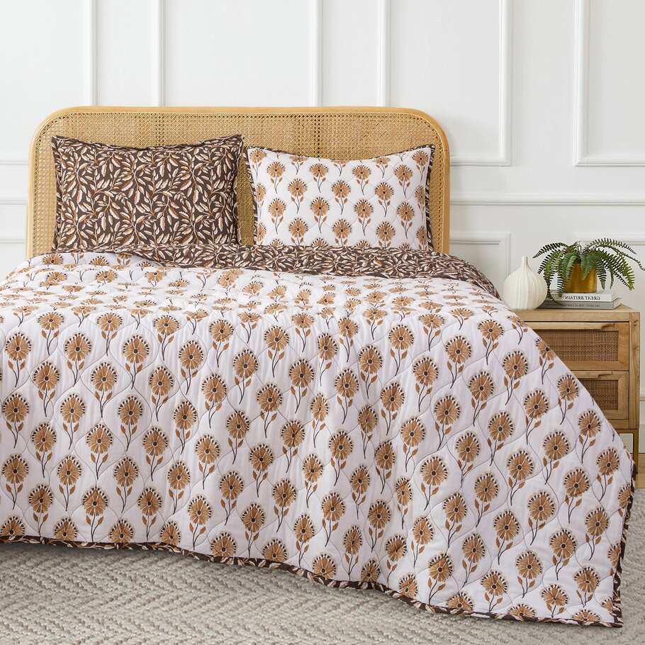 Brentwood Reversible Quilt Set featured in a modern bedroom, blending seamlessly with contemporary décor and neutral palettes.