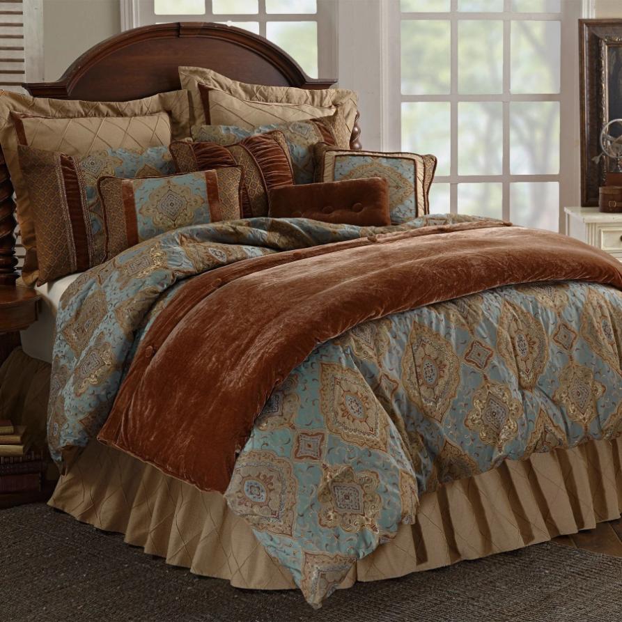 Brianna Lodge Comforter showcasing intricate brocade embroidery with shimmering golden threads against a soft satin dusty turquoise fabric.