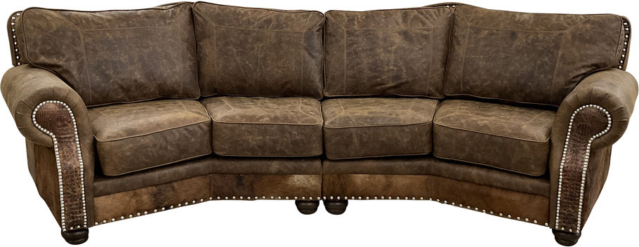The Brown Apachean Curved Sectional in Cora Sierra leather with Gator Hornback Rustic Cognac accents and exotic cowhide detailing, shown in a full front view highlighting its luxurious design.