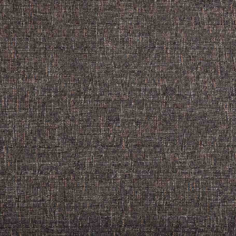 Detailed image showcasing the classic tweed weave pattern, highlighting the multi-dimensional texture of the fabric.