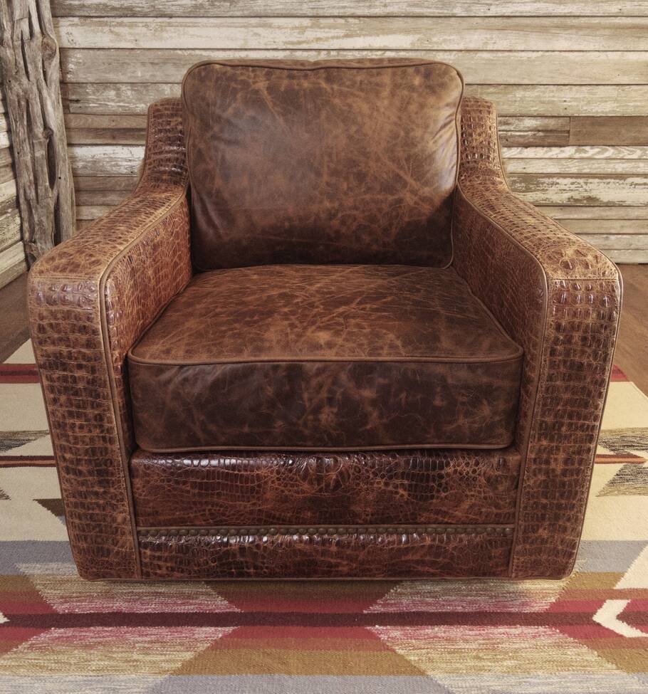 Front view of the Buffalo Luxe Swivel Chair, featuring authentic Buffalo hide, Cora Pecan leather, and rustic cognac gator accents, showcasing its rustic charm and Western-inspired design.