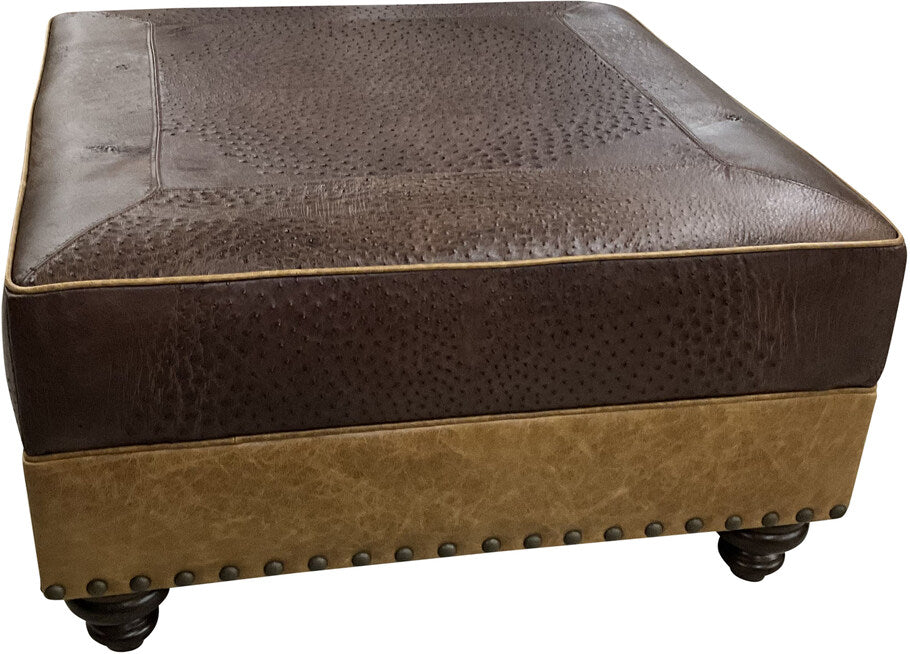 Close-up of the Caprieze Square Ottoman showcasing its luxurious hand-dyed ostrich hide top, offering a unique texture and refined elegance.