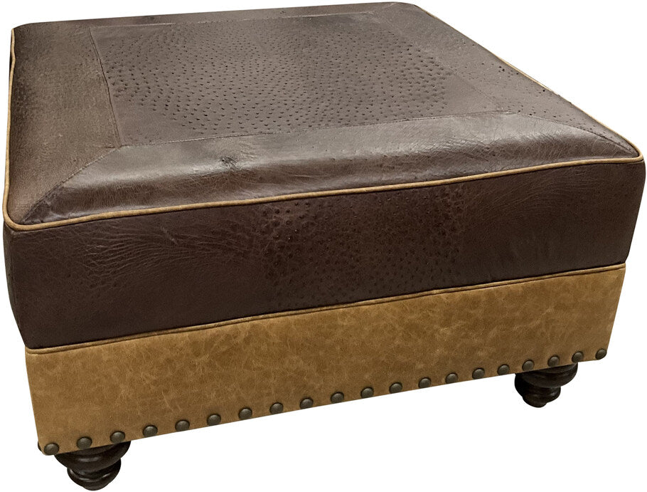 Side view of the Caprieze Square Ottoman highlighting the Caprieze Healthy Glow leather bottom rail, complementing the exotic ostrich hide top.