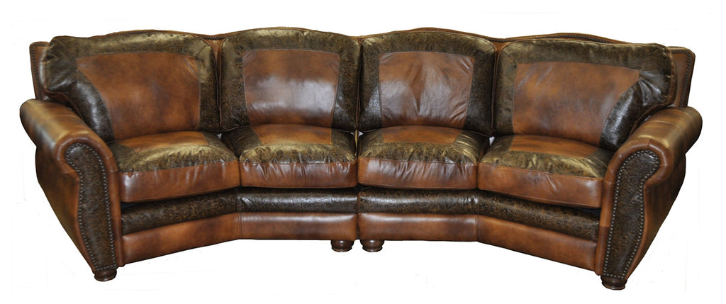 Brown leather sectional sofa with tooled picture framing accents on each seat cushion and back cushion on a white background