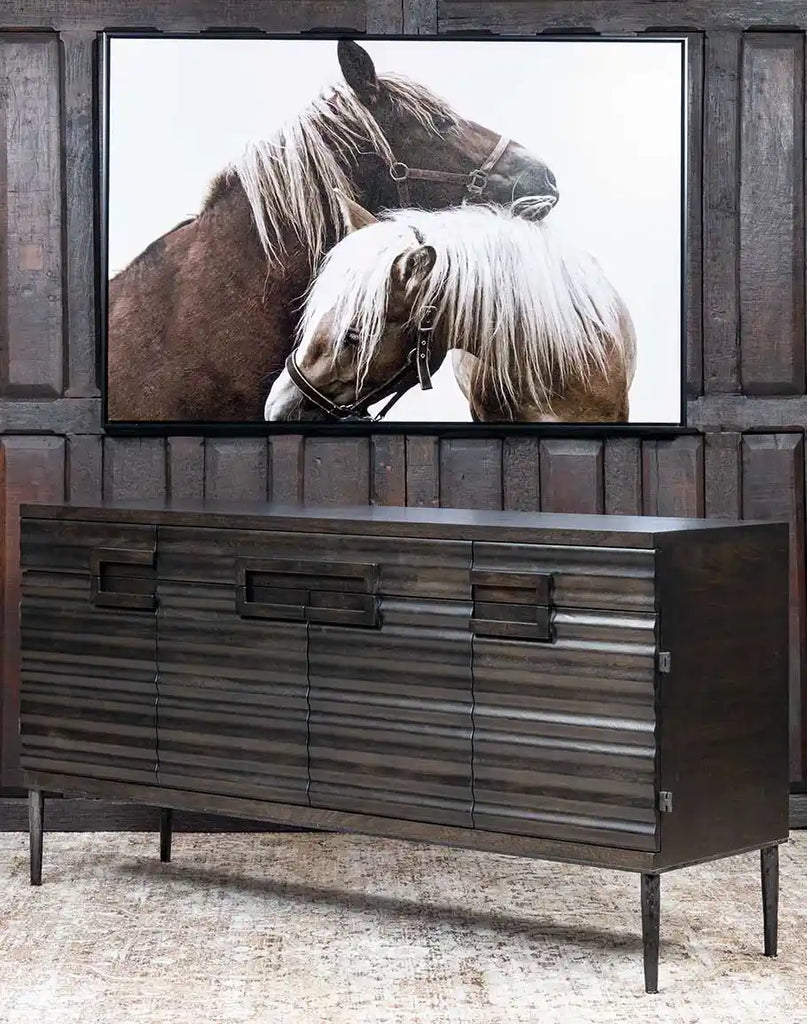 Angled side view of the Charcoal Cascade Buffet, emphasizing its sturdy hand-forged iron legs and textured wood detailing.