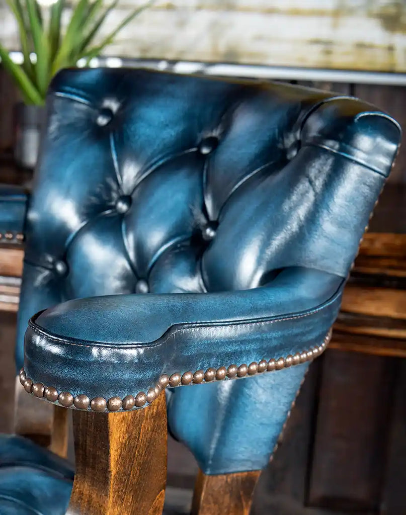 Close-up of the padded arms on the Chisum Hondo Barstool for enhanced comfort and support.