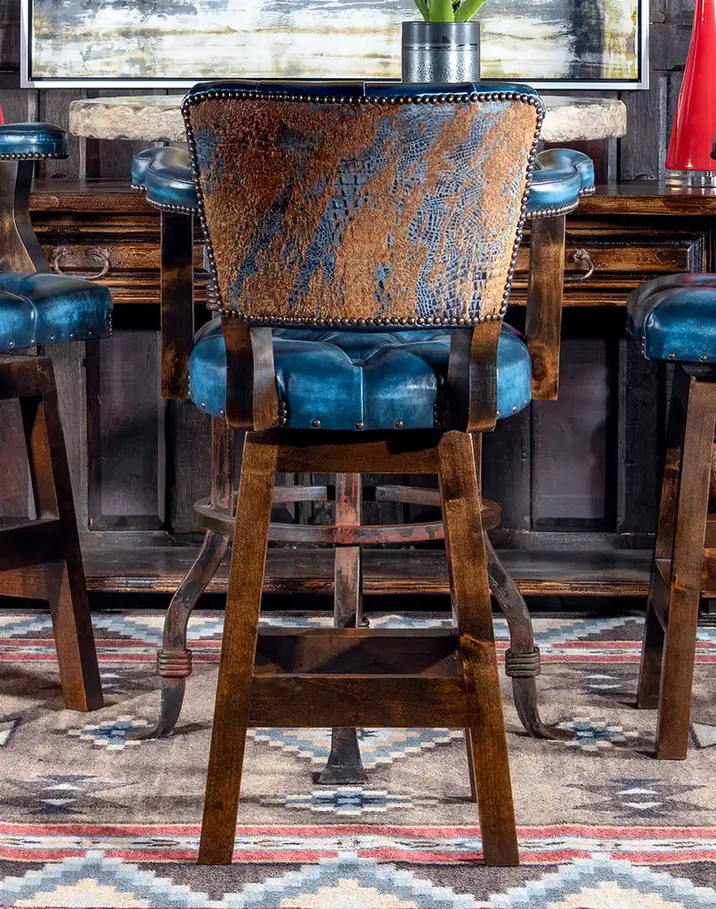 Back view of the Chisum Hondo Barstool showcasing the brindle cowhide back with stamped croc pattern.