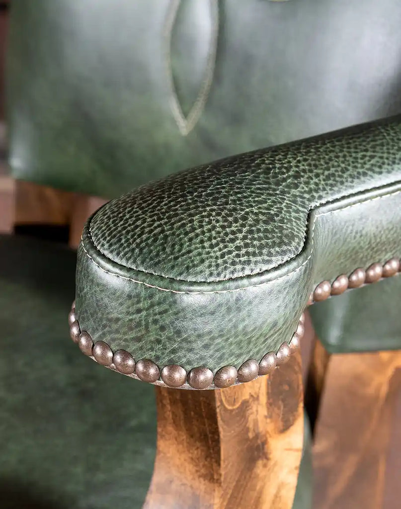 Close-up of the Chisum TX Olive Green Barstool's leather armrest showcasing premium craftsmanship and comfort.