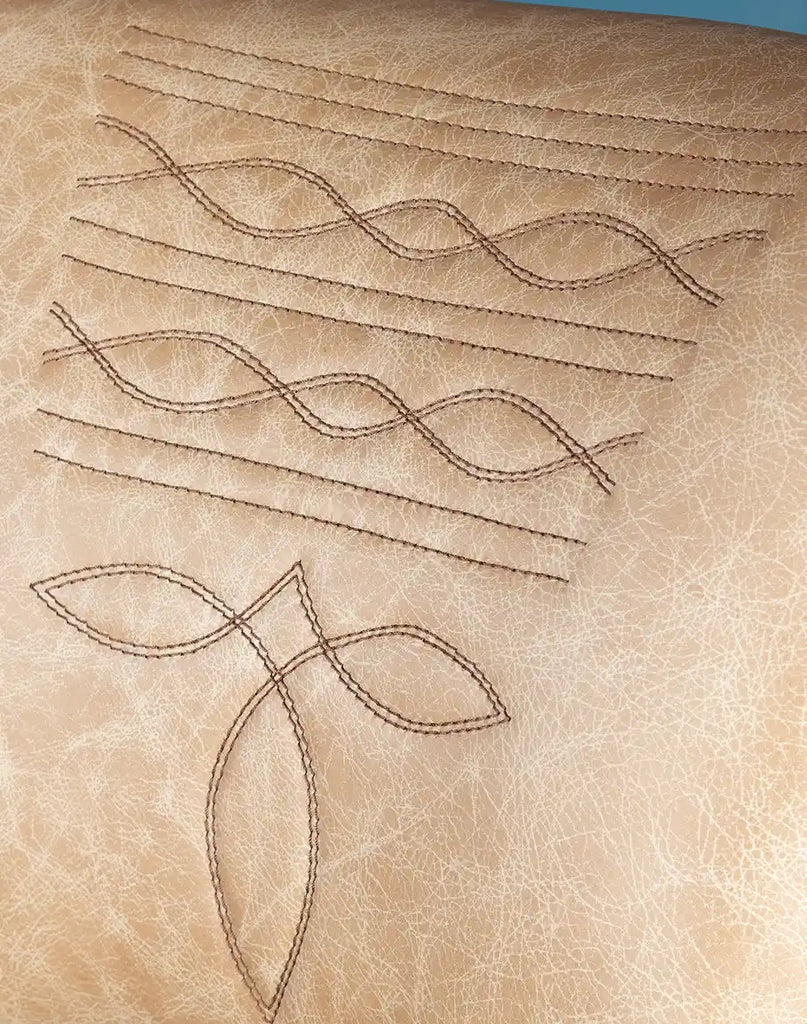 Iconic cowboy boot stitch emblem on the seat back of the Chisum TX Paraluman Barstool, adding a unique western-inspired flair.