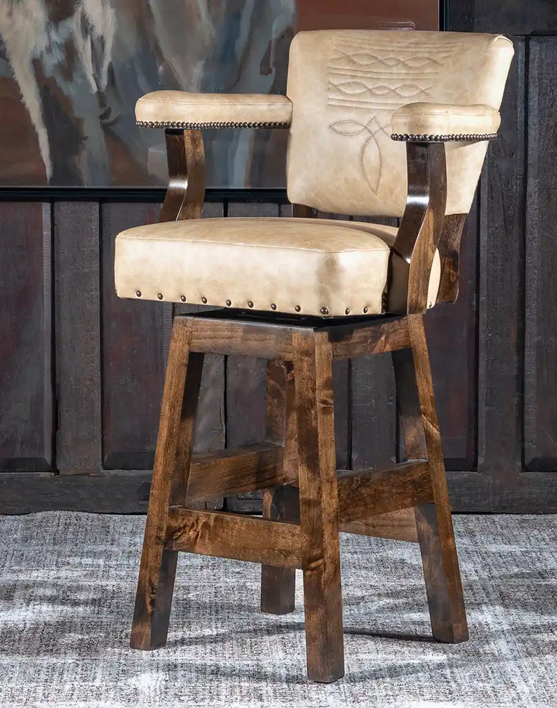 Front view of the Chisum TX Paraluman Barstool featuring top-grain vanilla leather upholstery, a cowboy boot stitch design, and an alder wood frame.