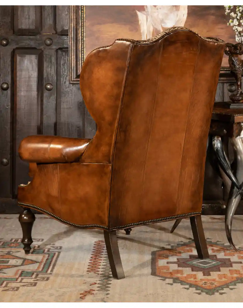 Rear image showcasing the tailored leather back and sturdy construction of the Classic Leather Wingback Chair.
