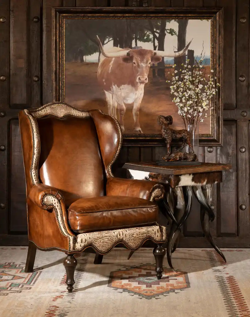 The Classic Leather Wingback Chair styled in a sophisticated living room, demonstrating its timeless and elegant appeal.