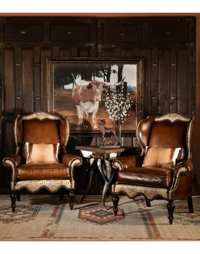 The Classic Leather Wingback Chairs styled in a refined home interior, complementing rustic and sophisticated décor with its luxurious leather and timeless design.