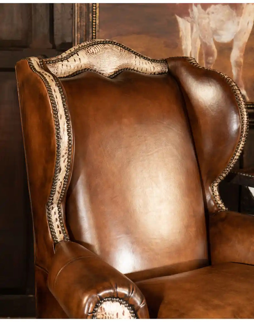 Detailed shot of the rich, hand-burnished leather texture, highlighting the premium craftsmanship of the Classic Leather Wingback Chair.