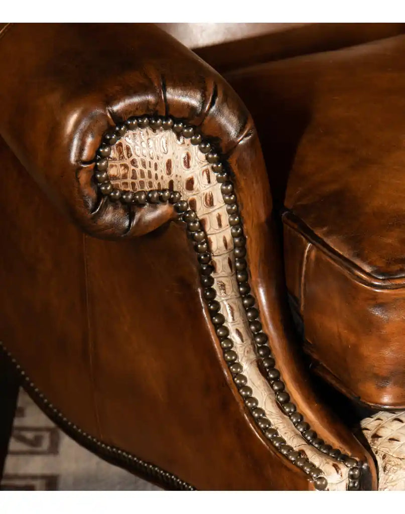 Close-up of the stamped croc leather accents on the arms and wing panels, adding a unique and sophisticated touch.