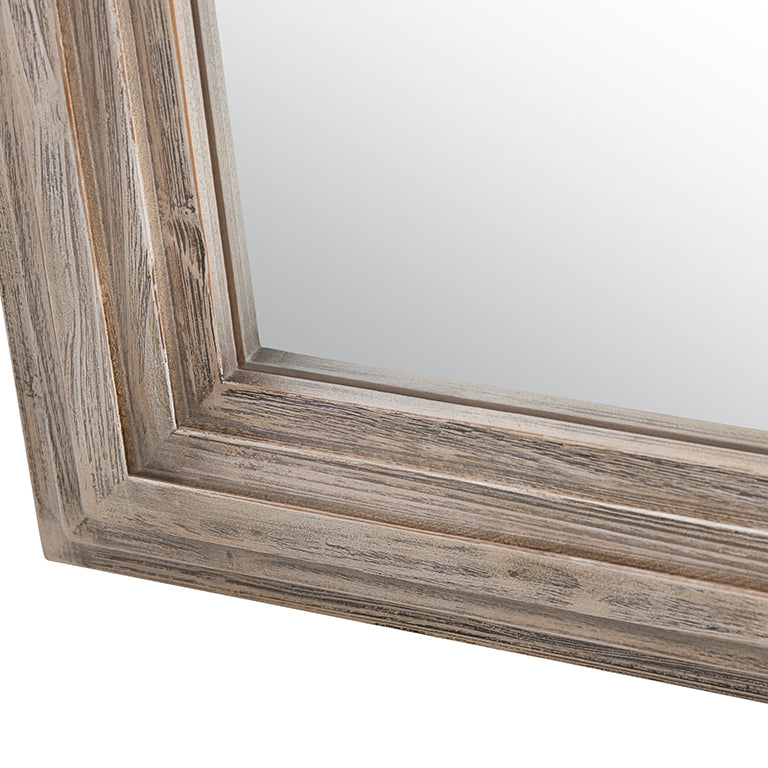 Wooden-framed mirror on a white background
