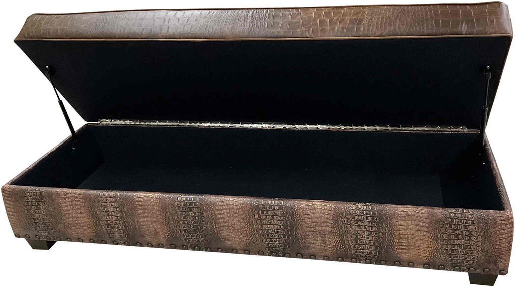 The Cora Storage Ottoman with an open storage compartment, revealing its spacious interior and optional gas shock mechanism for smooth opening and closing.