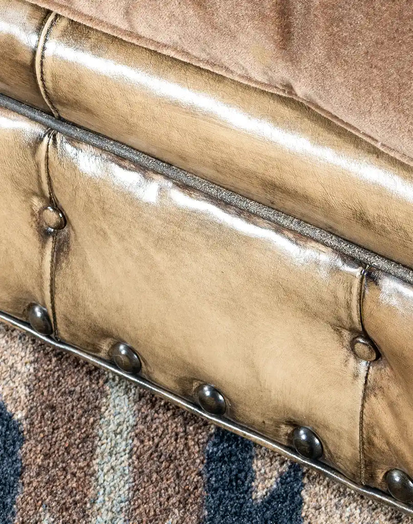 Smooth, hand-burnished full-grain leather with natural patina on the Dallas Chesterfield Sofa.