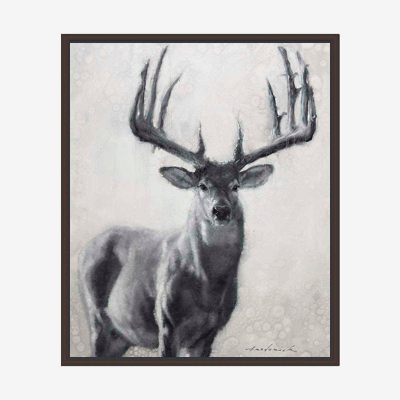 Framed artwork of a deer with large antlers on a textured background