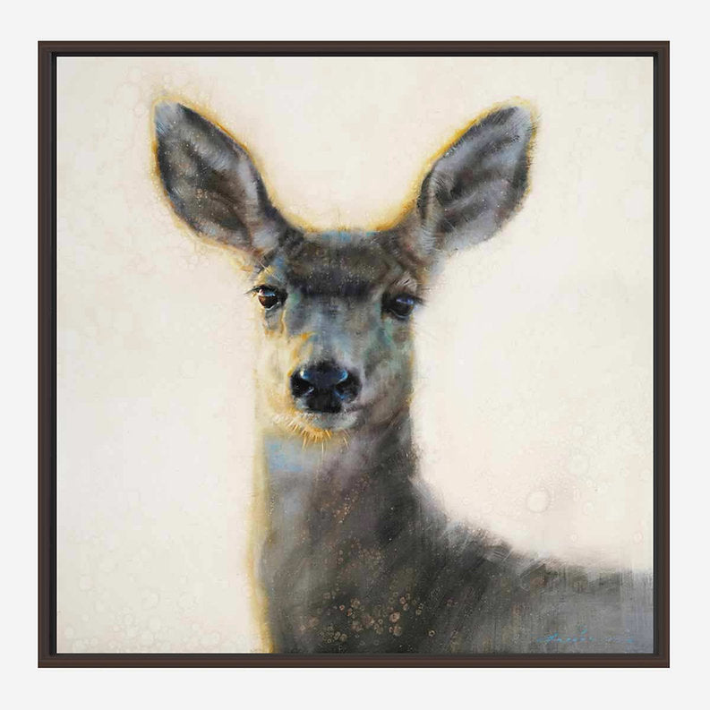 Framed artwork of a deer's head on a light background