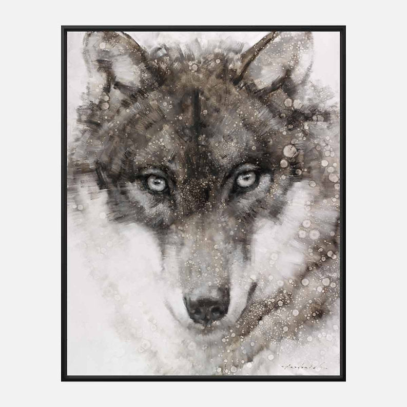 Framed artwork of a wolf's face with a snowy background