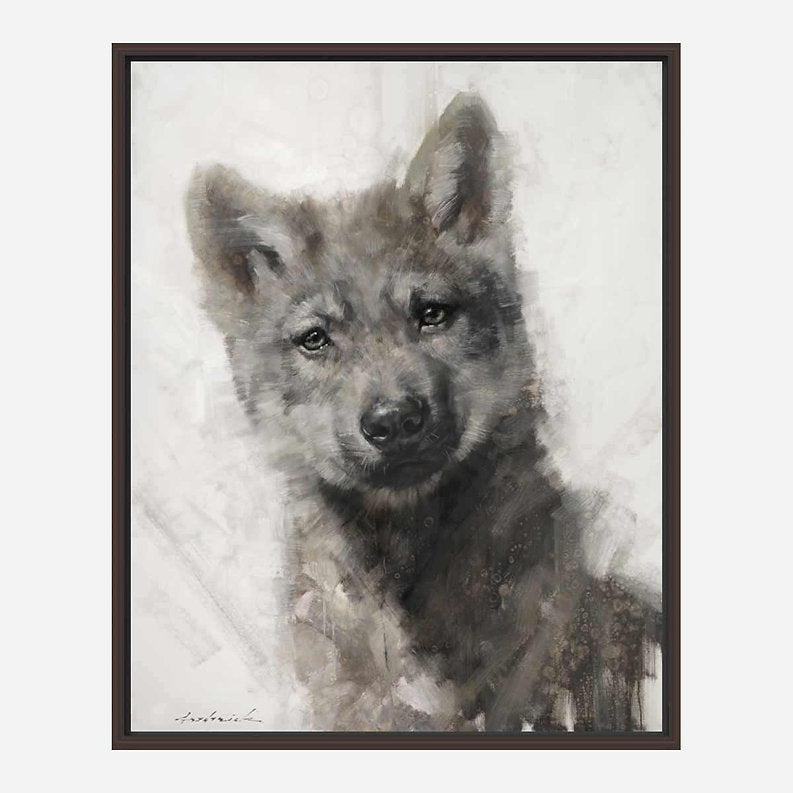 Brown framed artwork of a wolf cub on a light background.