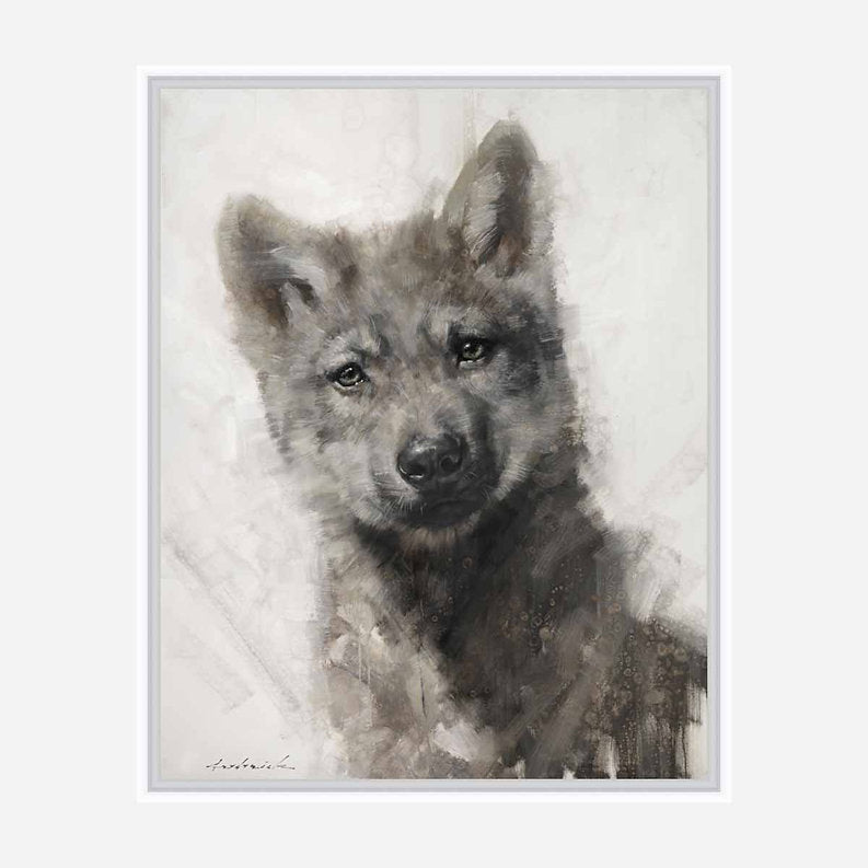 White framed artwork of a wolf cub on a light background.