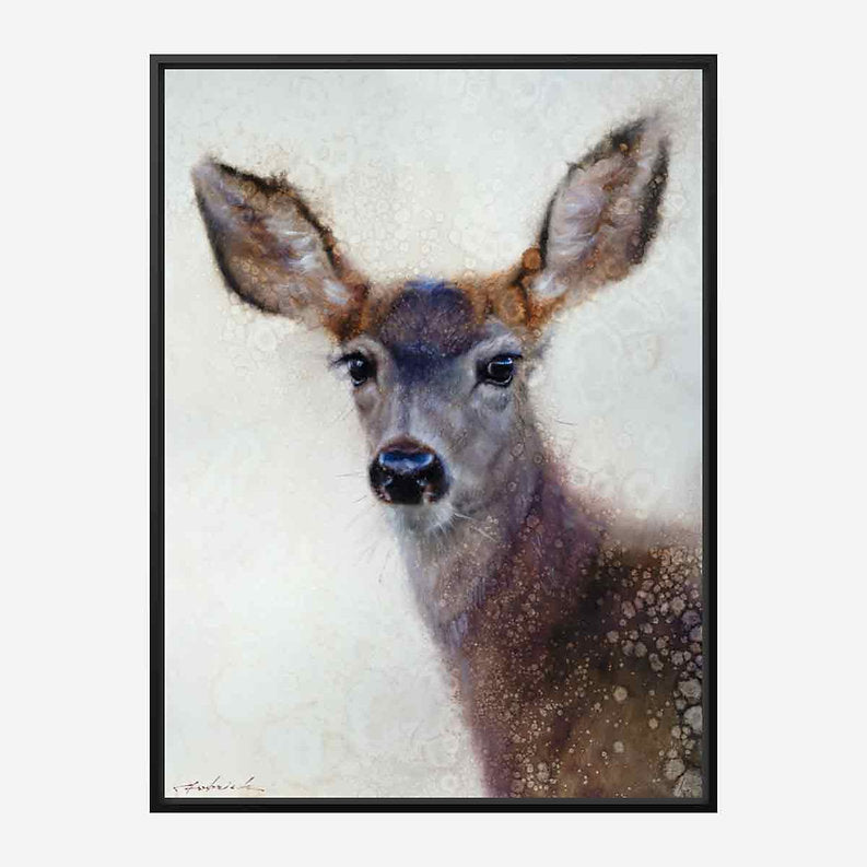 Black framed artwork of a deer's face on a textured background