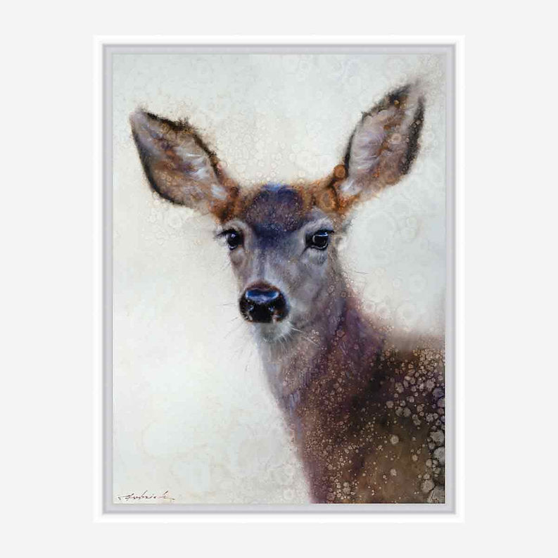 White framed artwork of a deer's face on a light background