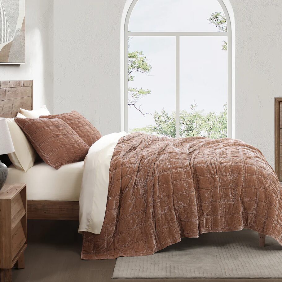 Dusty Rose Faux Silk Velvet Quilt Set styled in a contemporary bedroom, complementing neutral tones and minimalist décor.