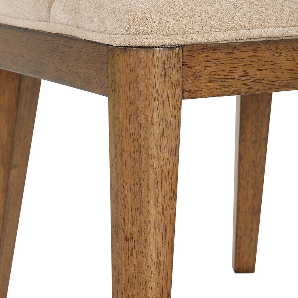 Aspen dining chair showcasing a mix of mid-century aesthetics and transitional features with a warm wood finish.