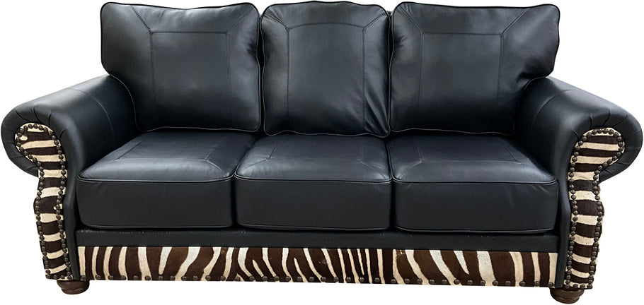 Front view of the Exotic Zebra Sofa featuring deep black Fendi Night leather and striking zebra hide accents on the arms and base.