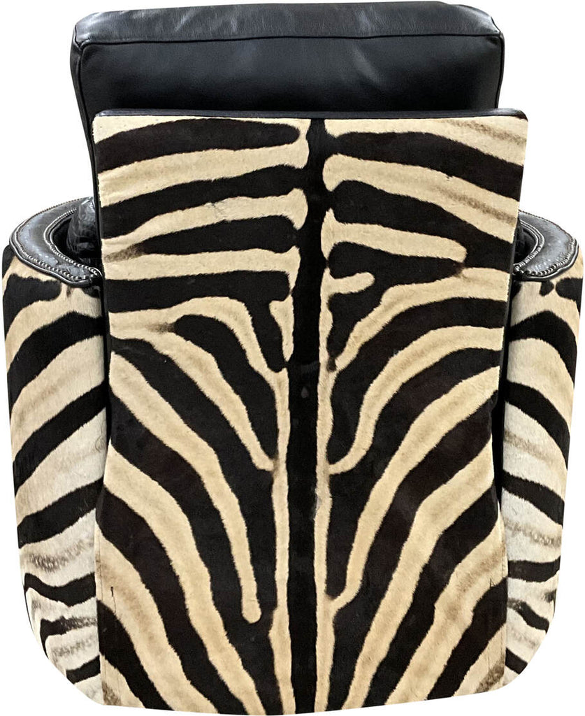 Rear view of the Exotic Zebra Swivel Recliner featuring genuine zebra hide on the outside back and arms, adding an exotic touch to the design.