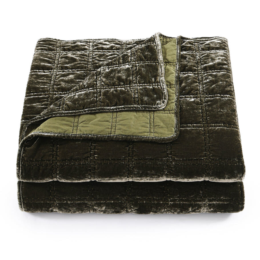 Close-up showcasing the smooth, faux silk velvet fabric of the Fern Green Quilt, offering a luxurious feel and subtle sheen.